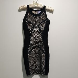 Chic Black and Cream Patterned Mini Dress.